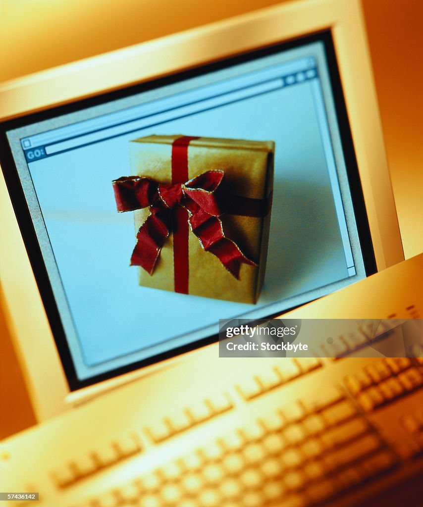 A computer displaying a picture of a gift