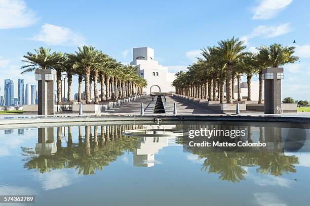 qatar, doha, entrance to the museum of islamic art - doha museum stock pictures, royalty-free photos & images