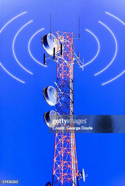 low angle view of a telecommunication tower exuding sound waves - exuding stock pictures, royalty-free photos & images