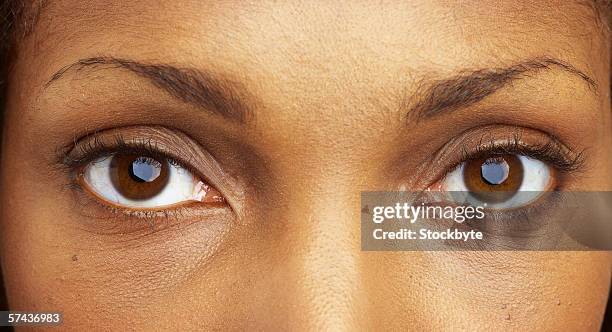 close-up of a woman's eyes - human nose stockfoto's en -beelden
