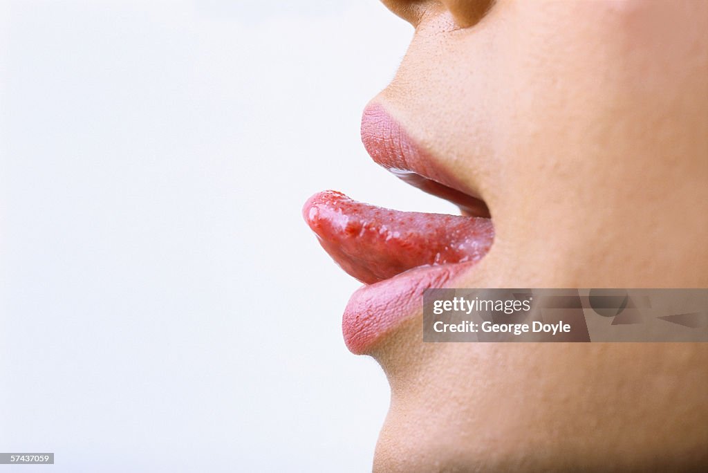 Close-up of a woman sticking her tongue out