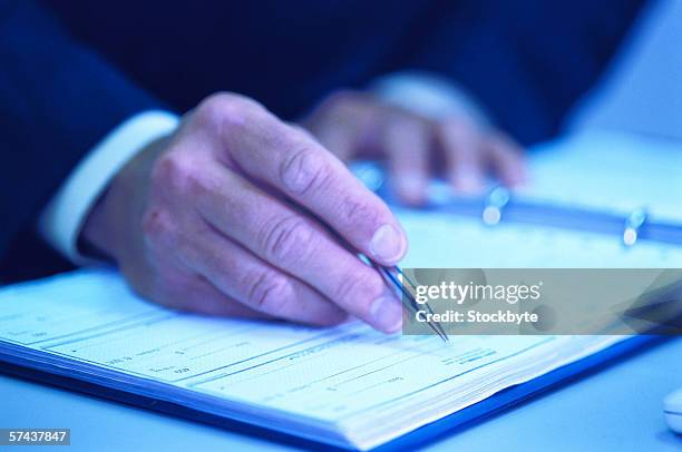 Cheque Signing Form Sign Cheque Book Photos and Premium High Res Pictures - Getty Images