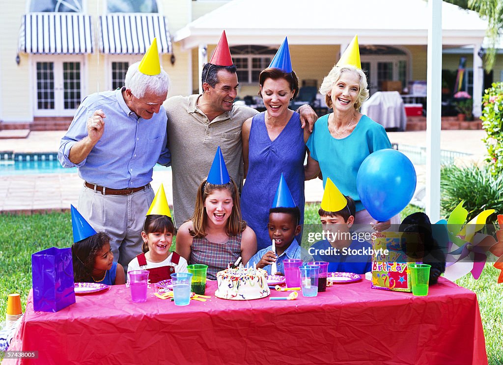 View of a three generational family celebrating a birthday
