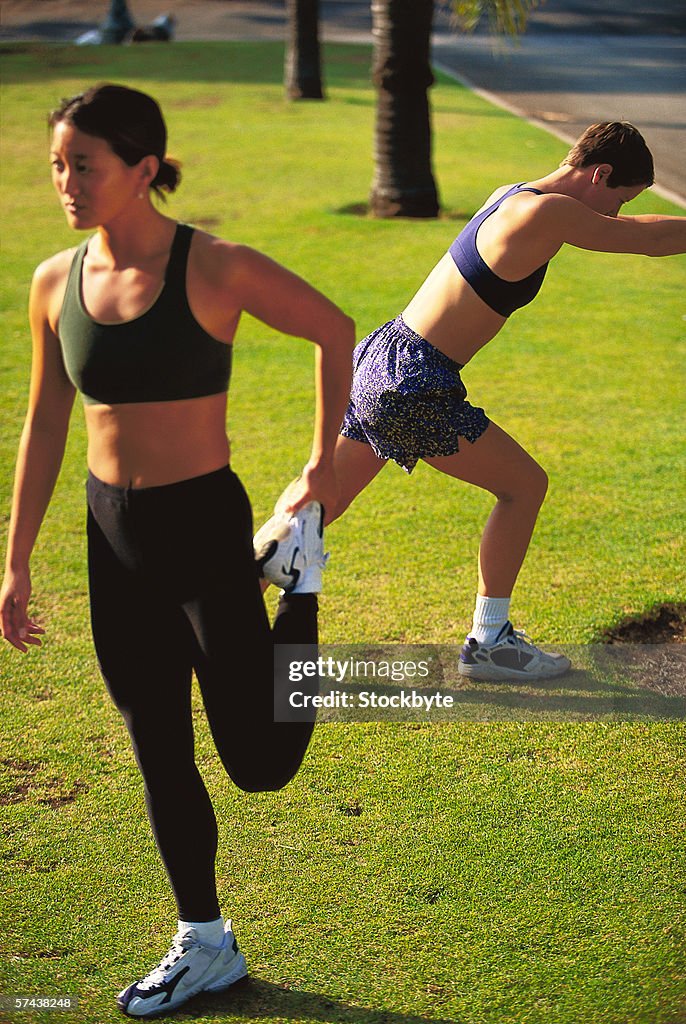 View of young women exercising