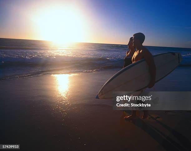 Beach Rode Side Profile Woman Beach Walking Profile Photos and Premium High Res Pictures ...
