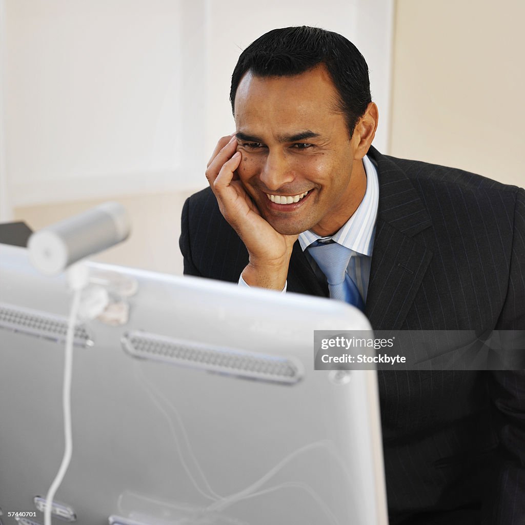 Elevated view of a businessman using a webcam