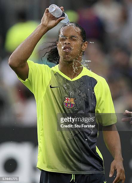 Barcelona star Ronaldinho cools down with some water before the UEFA Champions league semi final between Barcelona and AC Milan on April 26, 2006 at...