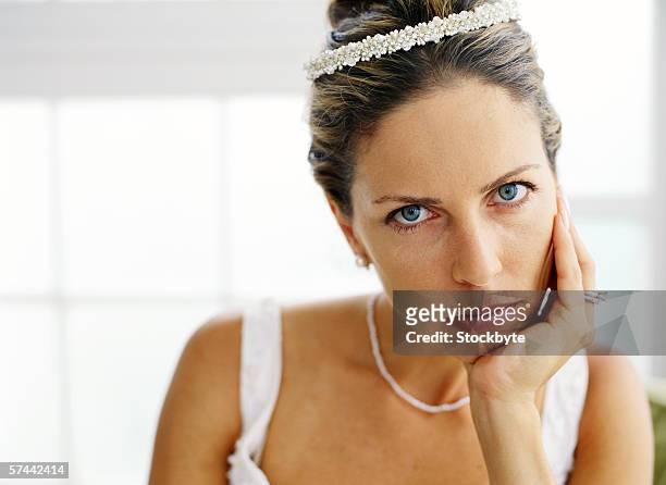 portrait of a bride waiting - bruid stockfoto's en -beelden