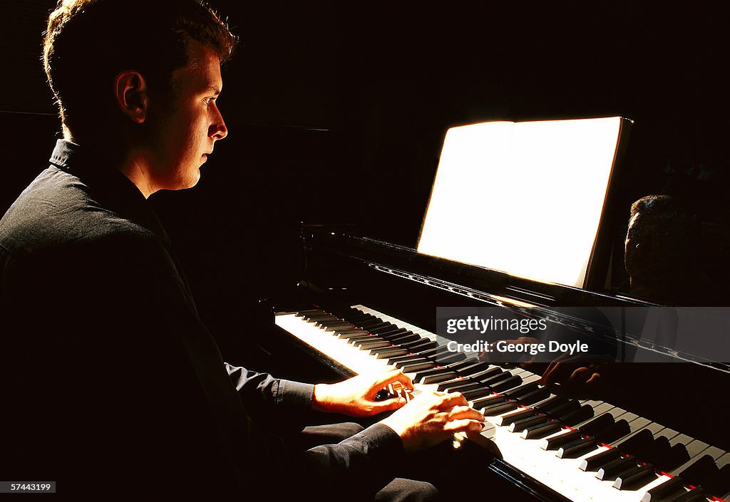 Shot of a man playing the piano