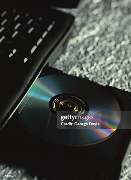an open cd room of a laptop - dvd player stock pictures, royalty-free photos & images