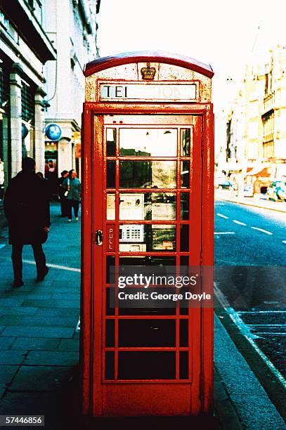 view of a telephone booth in london - pay phone stock pictures, royalty-free photos & images