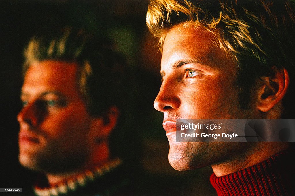 Side profile of two young men