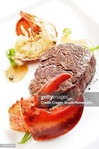 surf and turf, filet steak with seafood - filleted stock pictures, royalty-free photos & images