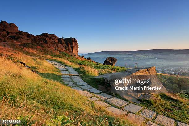 the cow & calf rocks, ilkley, west yorkshire - west yorkshire stock pictures, royalty-free photos & images