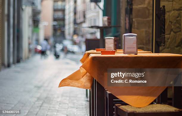 the orange tablecloth - napkin holder stock pictures, royalty-free photos & images