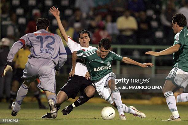 Valdomiro , of Palmeiras, fights for the ball with Danilo , of Sao Paulo FC, during their Libertadores Cup football match between two Brazilian teams...