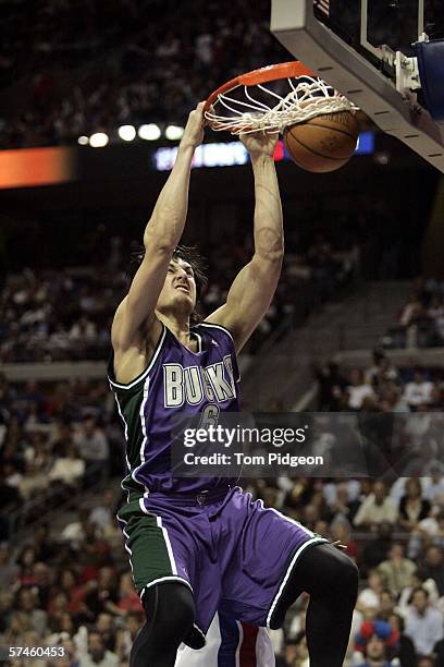 Andrew Bogut of the Milwaukee Bucks dunks against the Detroit Pistons during the second quarter in game one of the 2006 NBA Quarterfinals on April...