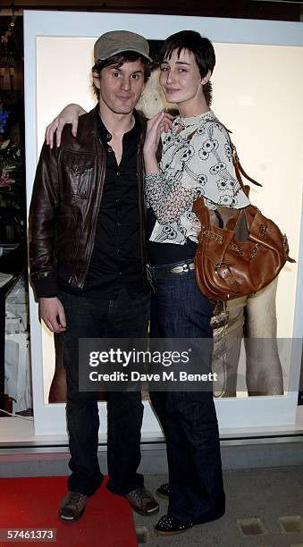 Erin O'Connor and her partner John Kent attend the private view for 'Look At Me - A Retrospective', a new photographic exhibition by celebrity...