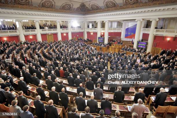 Deputies at the Russian state Duma listen the national anthem during the centennial anniversary meeting of the lower house of the Federal Assembly in...