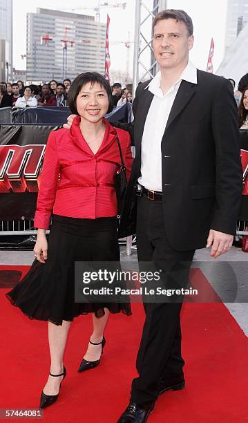 Anh Dao Traxel arrives with her husband to attend the "Mission: Impossible III" French Premiere on April 26, 2006 in La Defense, outside Paris.