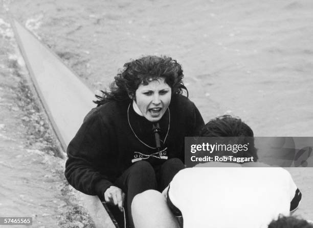 Oxford cox Susan Brown, the first woman to take part in the annual Oxford versus Cambridge boat race, leads her crew to victory, 4th April 1981. Here...