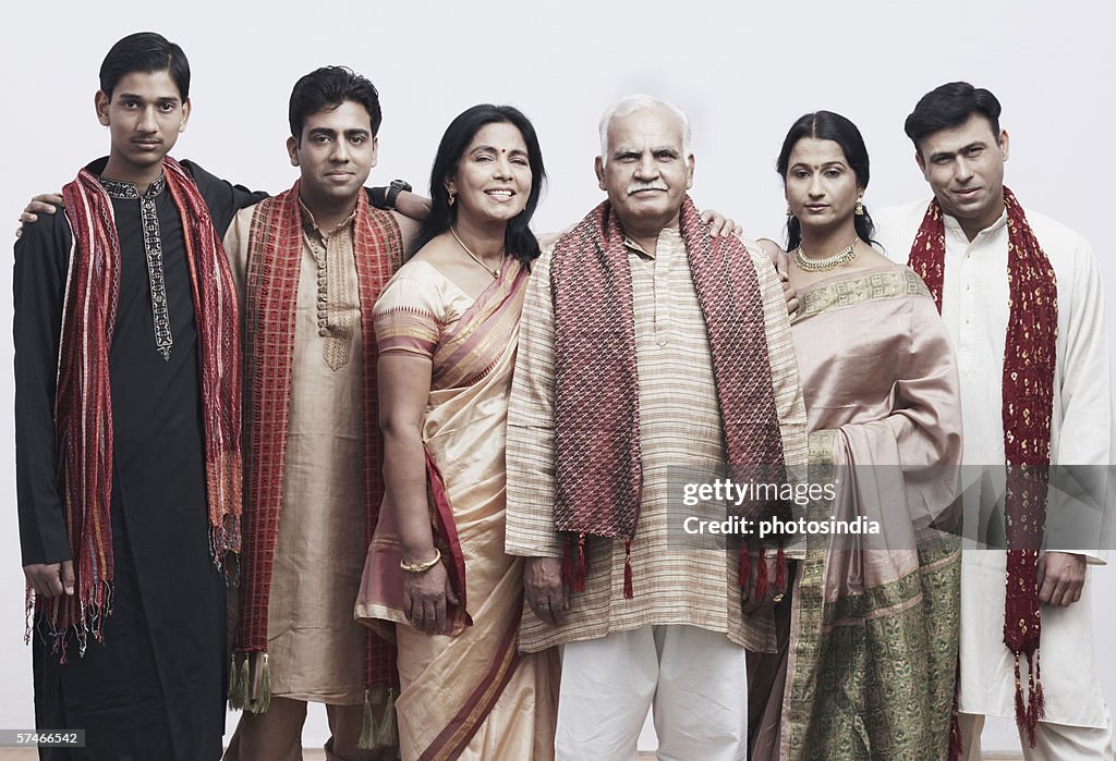 Portrait of a mature couple and their children smiling