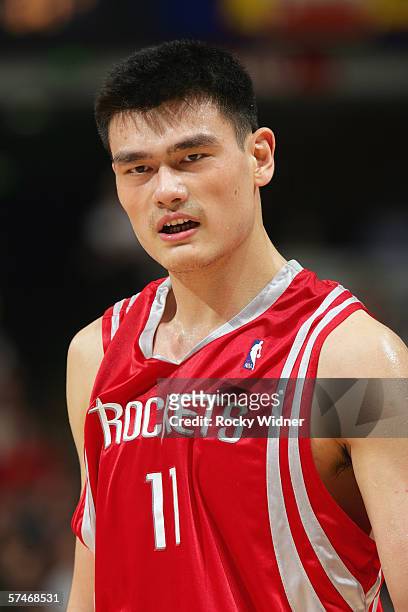 Yao Ming of the Houston Rockets looks right at the camera against the Sacramento Kings on April 9, 2006 at ARCO Arena in Sacramento, California. NOTE...