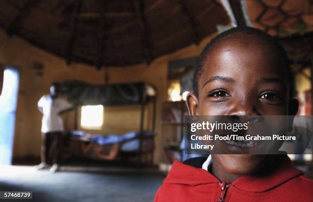 Mutsu Potsane waits in his bedroom at the Mants'ase children's home for Prince Harry to arrive on a return visit to Lesotho in southern Africa on...