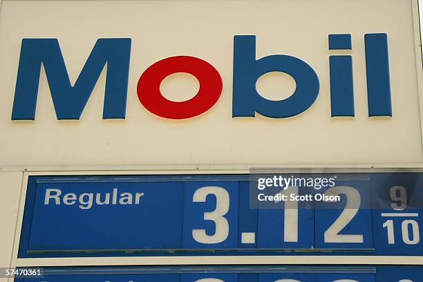 Sign displays gas prices at a Mobil gas station April 27, 2006 in Chicago, Illinois. Exxon Mobil Corp., the parent company of Mobil and the world's...