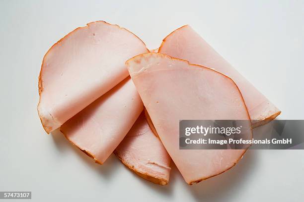 a few slices of turkey ham - cold cuts stock pictures, royalty-free photos & images