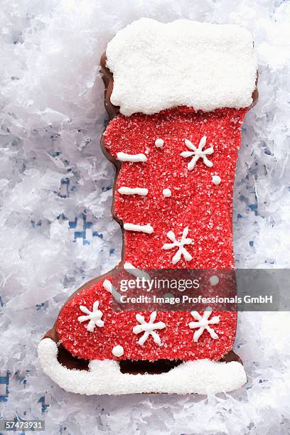 decorated chocolate boot for christmas - nikolausstiefel stock-fotos und bilder