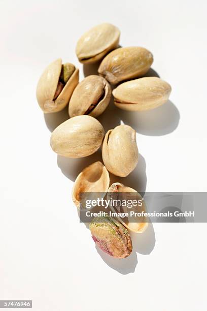 pistachios in their shells - brainfood stockfoto's en -beelden