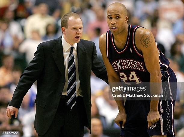 Coach Frank Lawrence of the New Jersey Nets gives instructions to Richard Jefferson between plays against the Indiana Pacers during game three of the...