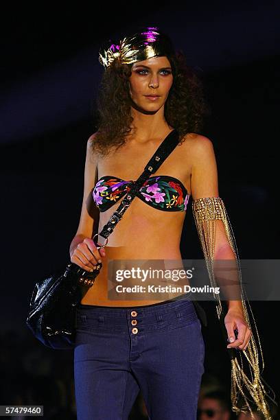 Model walks the runway at the One Teaspoon collection show at the Overseas Passenger Terminal during Mercedes Australian Fashion Week on April 28,...