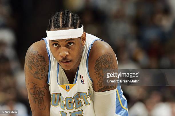 Carmelo Anthony of the Denver Nuggets watches during a free throw against the Los Angeles Clippers in the fourth quarter og game three of the Western...
