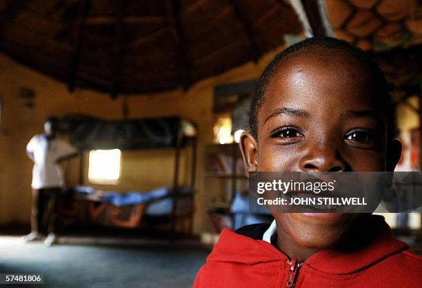 Mutsu Potsane waits in his bedroom at the Mants'ase children's home for Britain's Prince Harry to arrive on a return visit to Lesotho in southern...