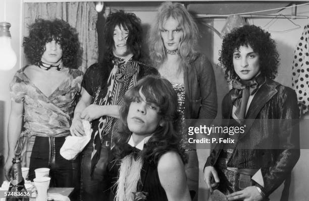 Influential American glam rock band the New York Dolls in their dressing room, 30th October 1972. Standing, left to right: Jerry Nolan, Johnny...