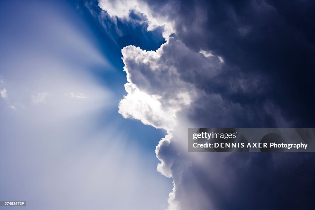 Sunbeams behind clouds