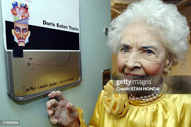 New York, UNITED STATES: Doris Eaton Travis, 102-year-old dancer, by the door to her dressing room at the New Amsterdam Theater 25 April 2006 in New...