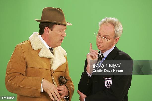 Commentator John Motson lookalike Mike Osmond and England football team manager Sven-Goran Eriksson lookalike Derek Williams are filmed for the video...