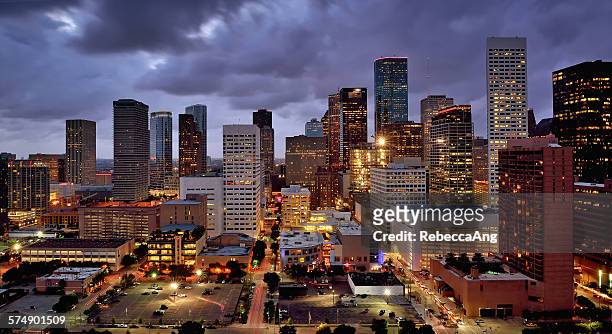 illuminated high rise buildings at night, houston, usa - houston texas night stock pictures, royalty-free photos & images