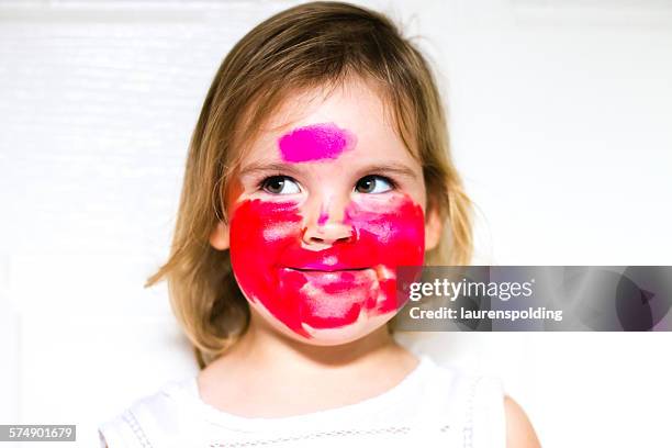 portrait of a girl with lipstick all over her face - lipstick stock pictures, royalty-free photos & images