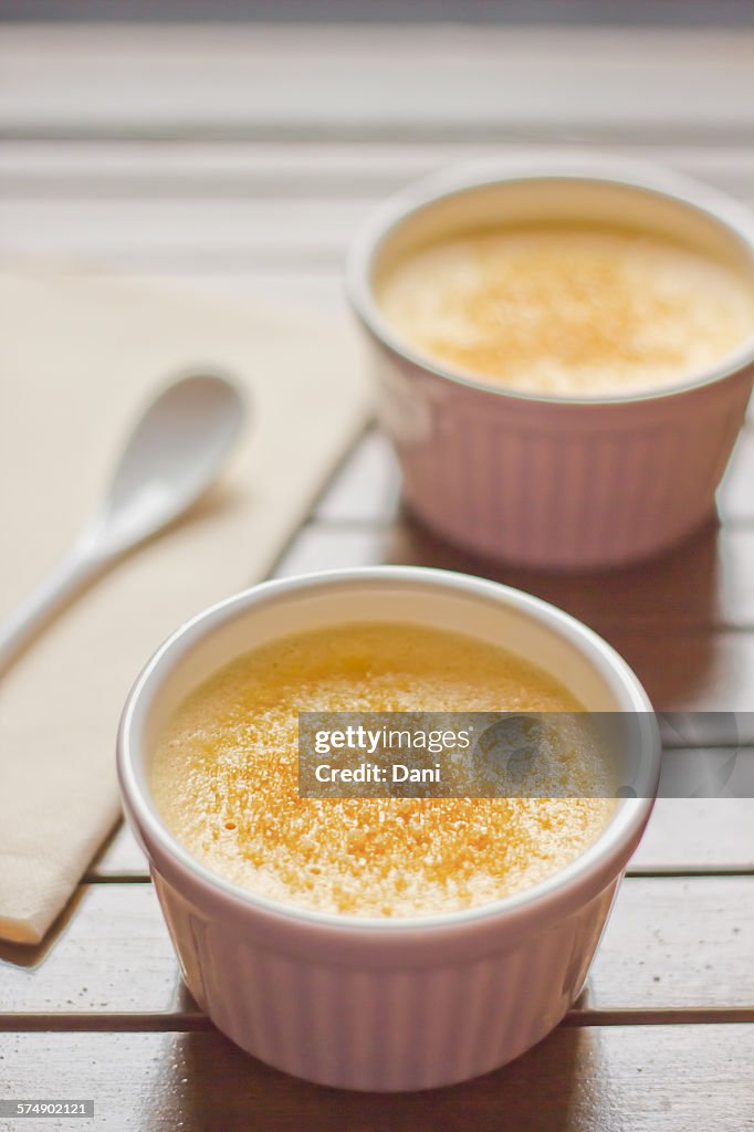 Two Creme Brulee deserts  In Ceramic Bowls