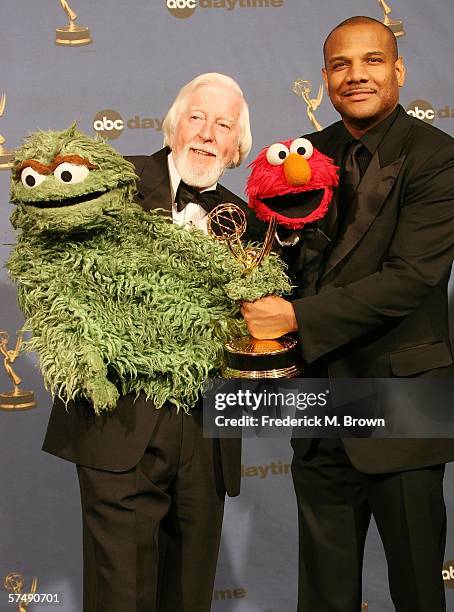 Carroll Spinney and Kevin Clash, winners of Outstanding Pre-School Children's Series for "Sesame Street", with Oscar the Grouch and Elmo pose in the...