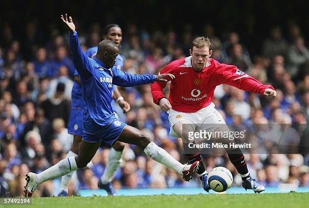 Claude Makelele of Chelsea challenges Wayne Rooney of Manchester United during the Barclays Premiership match between Chelsea and Manchester United...