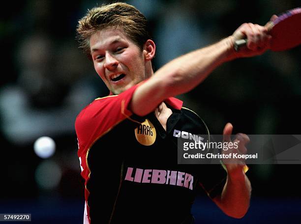 Bastian Steger of Germany plays a forehand during the match against Kirill Skachkov of Russia during the sixth day of the Liebherr World Team Table...