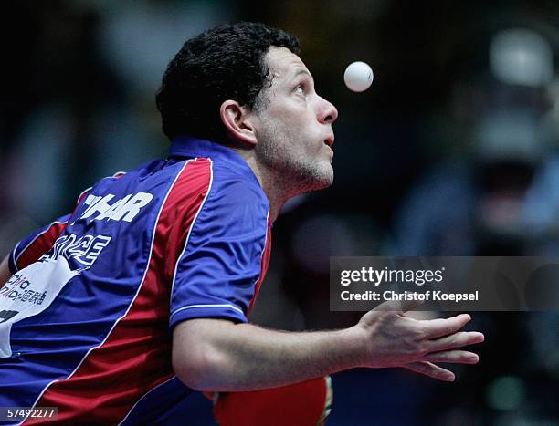 Patrick Chila of Franceserves against Ma Lin of China during the sixth day of the Liebherr World Team Table Tennis Championships at the AWD Dome on...