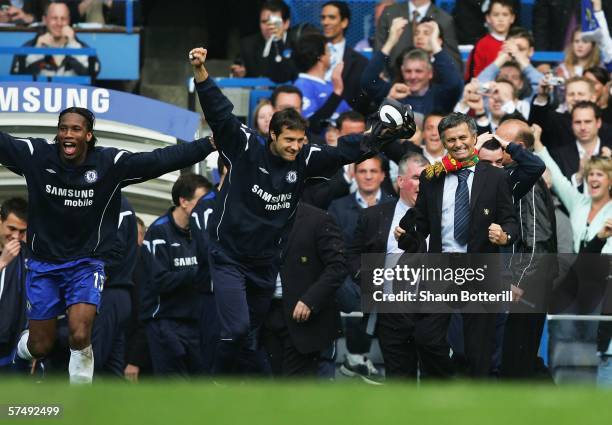 Didier Drogba and Carlo Cudicini of Chelsea and their manager Jose Mourinho celebrate winning the Barclays Premiership title after the match between...