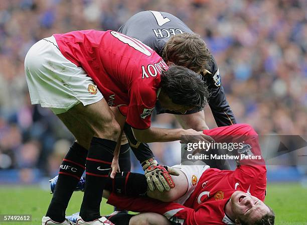 Wayne Rooney of Manchester United lies injured during the Barclays Premiership match between Chelsea and Manchester United at Stamford Bridge on...