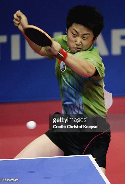 Yue Guo of China plays a forehand against Viktoria Pavlovich of Belarus in the women half-final during the sixth day of the Liebherr World Team Table...
